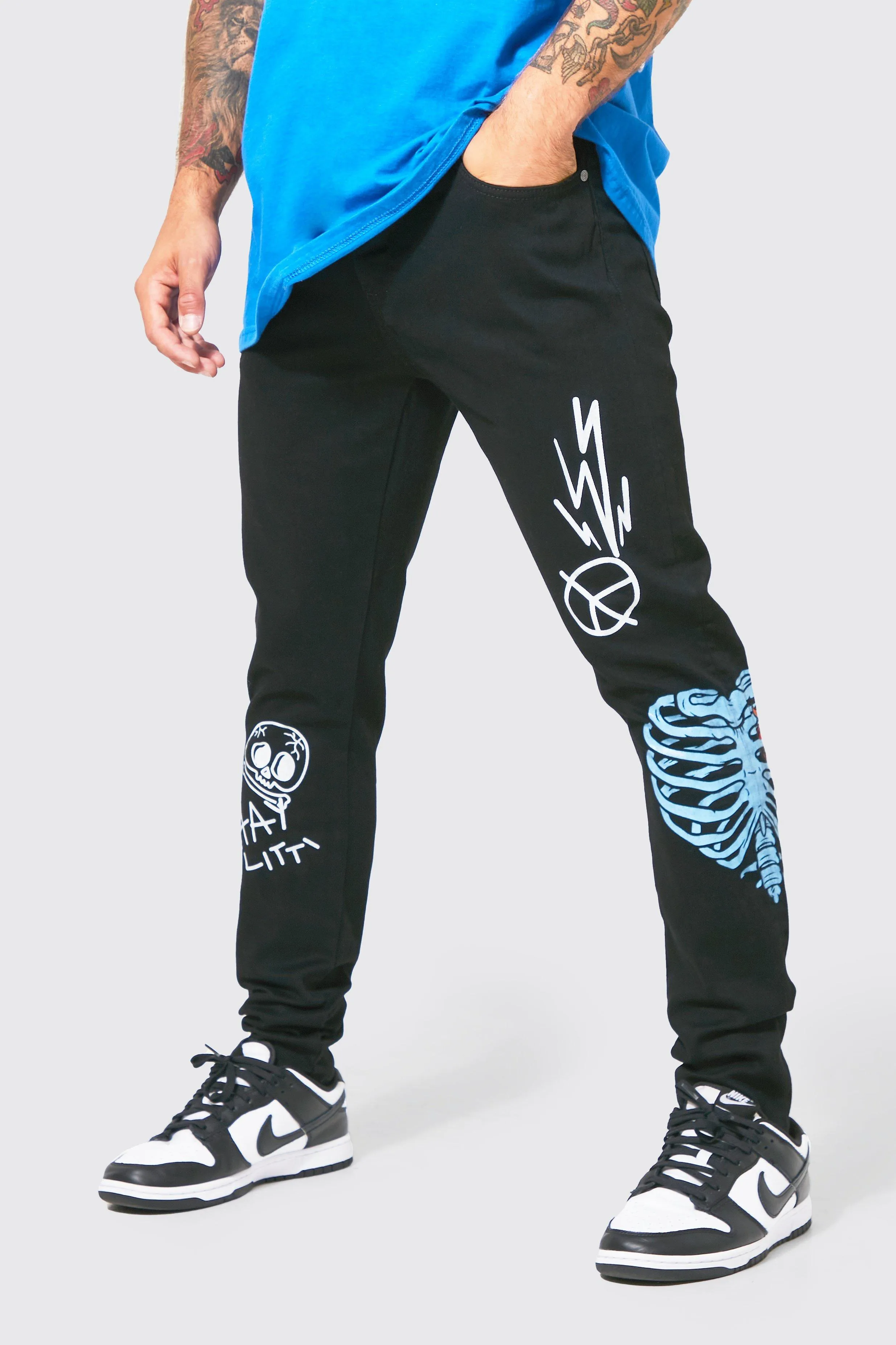 Skinny Stretch Multi Graffiti Print Jeans | boohooMAN UK