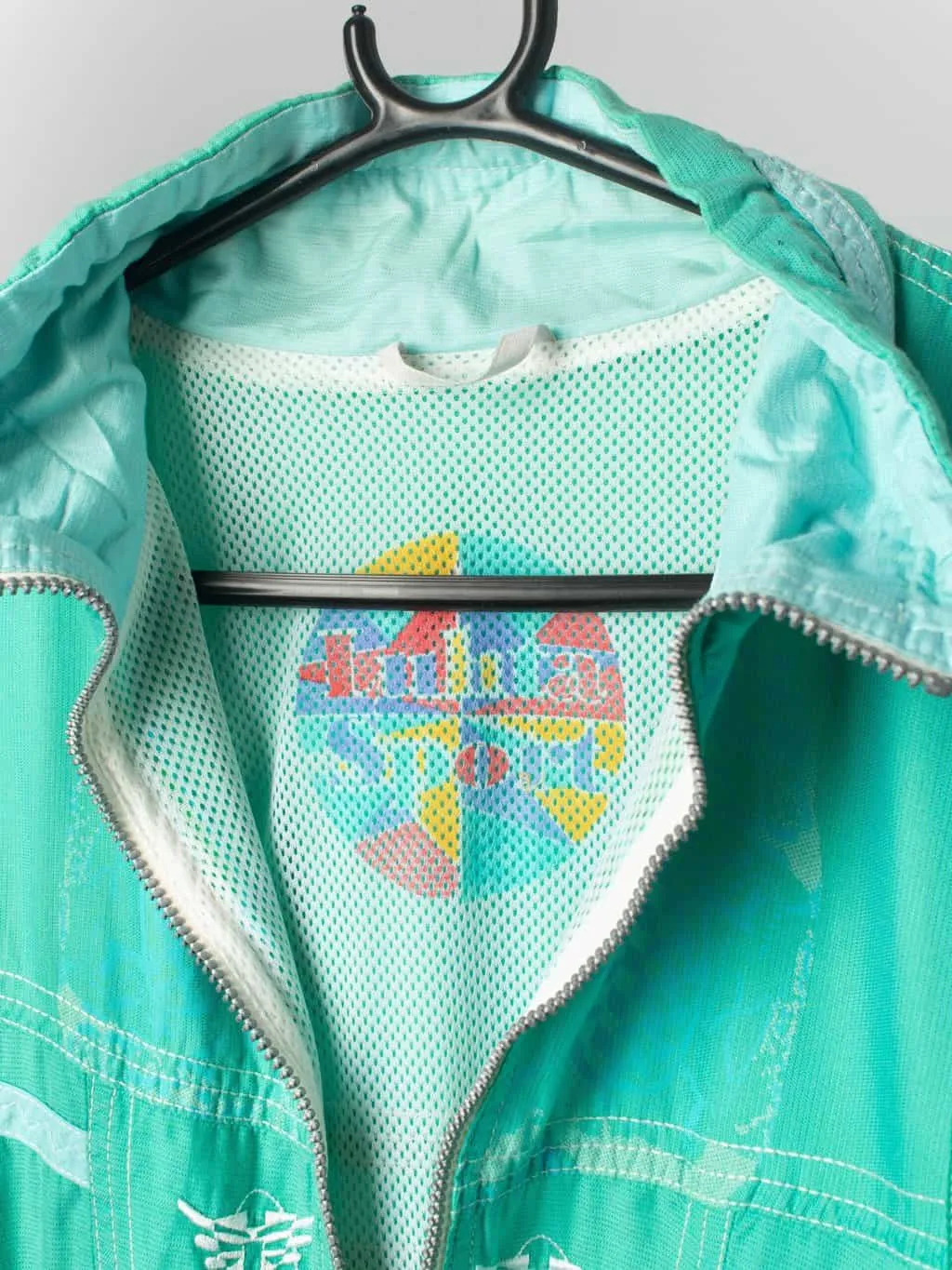 Womens vintage mint green windbreaker by Lutha sports 90s abstract pattern – Small / Medium